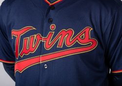 Twins replace cream-colored home uniforms with navy blue, scarlet red and yellowy trim the Twins call "MN Kasota Gold" Thumbnail